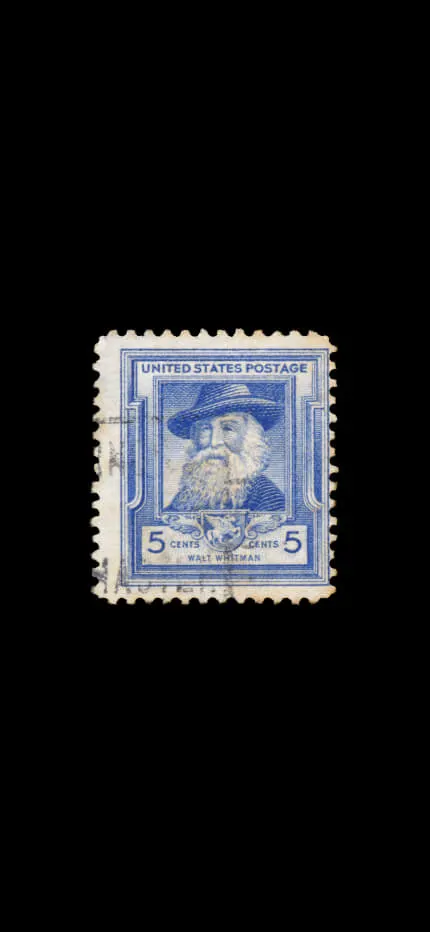 Blue five-cent United States Postage stamp showing a bearded man in a hat, labeled Walt Whitman.