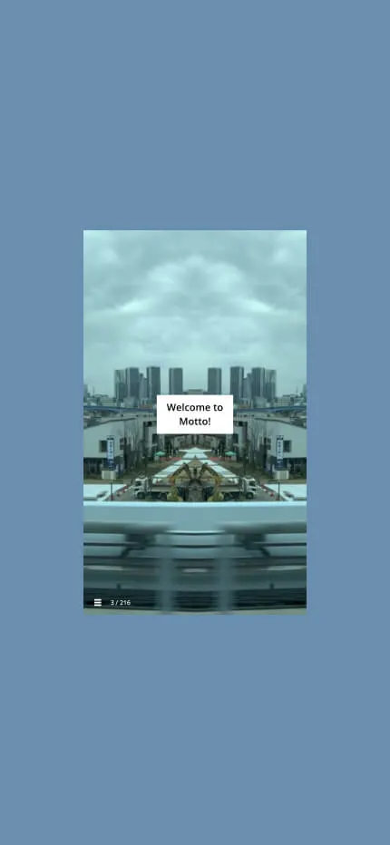 Phone-shaped screenshot of the motto website, a mirrored city skyline reading "Welcome to Motto!"